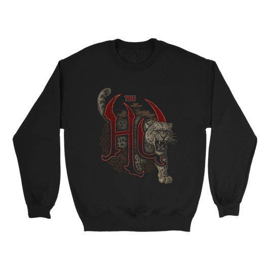 Snow leopard bursting through red The Hu logo on a black pullover crewneck sweatshirt.
