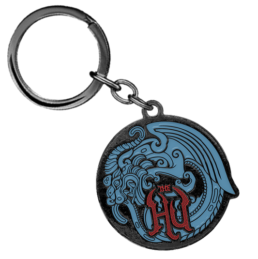 Keychain with blue and red The Hu  design on a white background