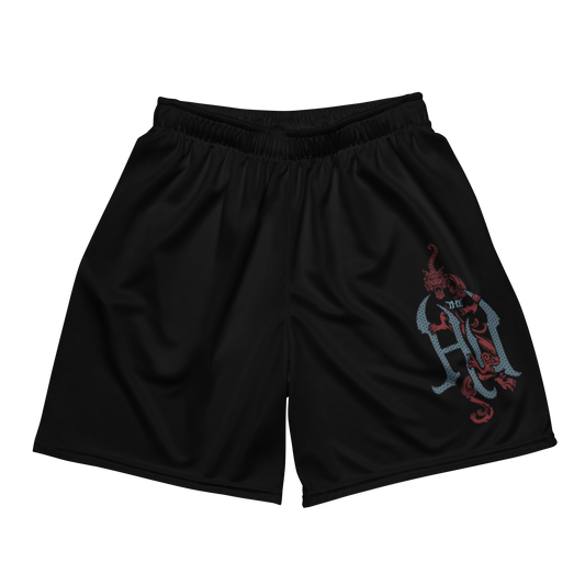 Black shorts with a red and gray The Hu logo on a white background